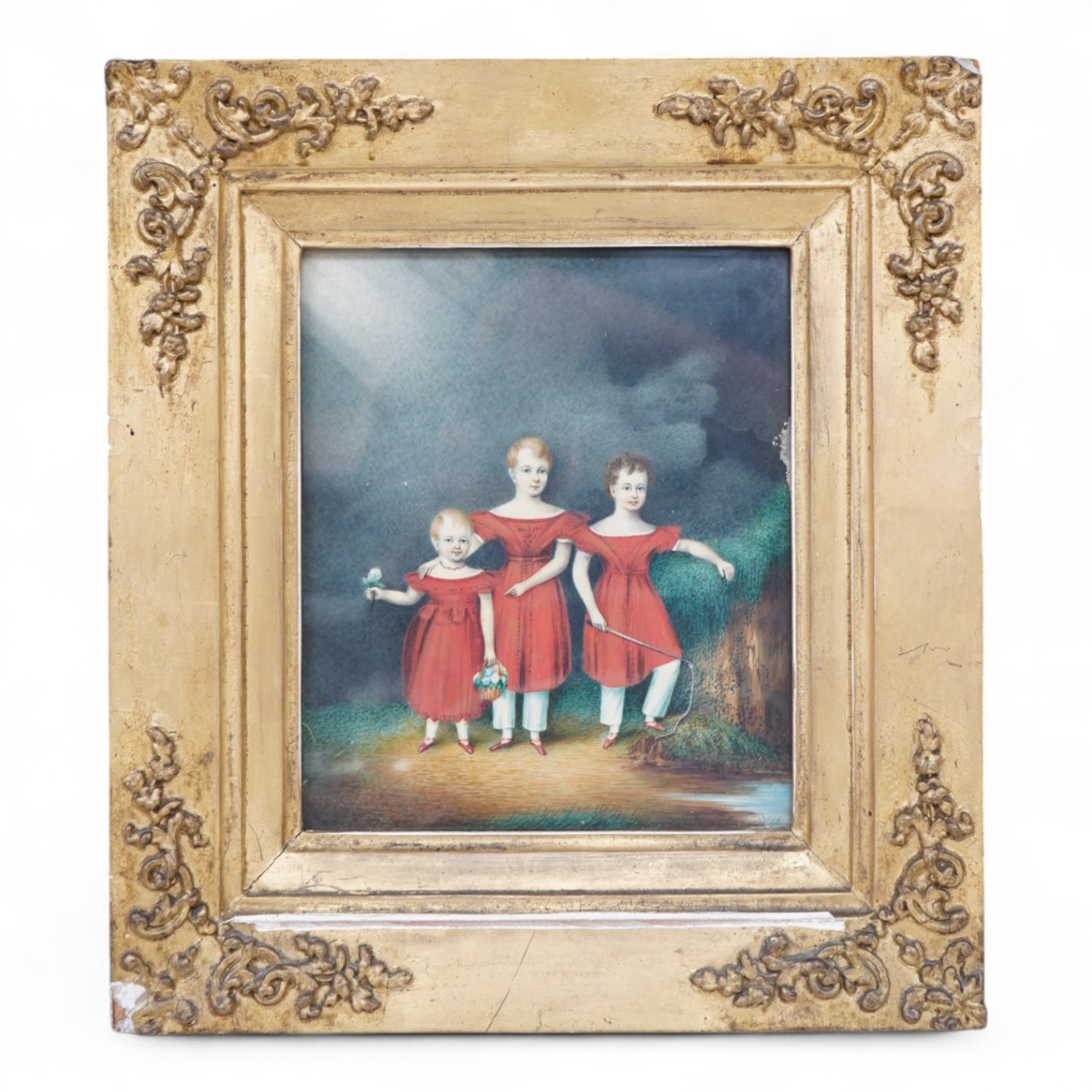 Regency School, Portrait of three siblings beside a river, unsigned, watercolour on card, 20 x 17cm, ornate gilt frame